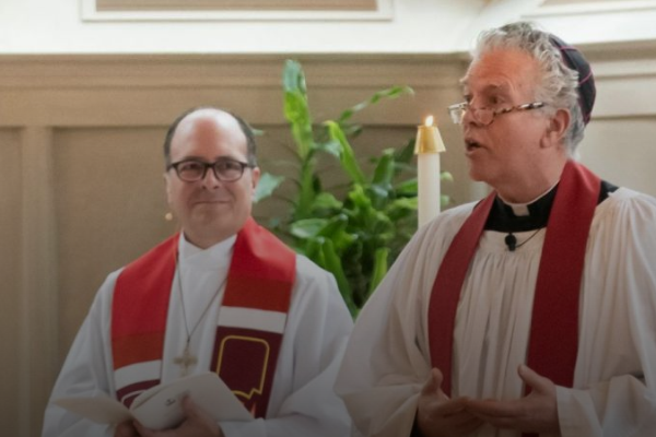 priest and bishop in church