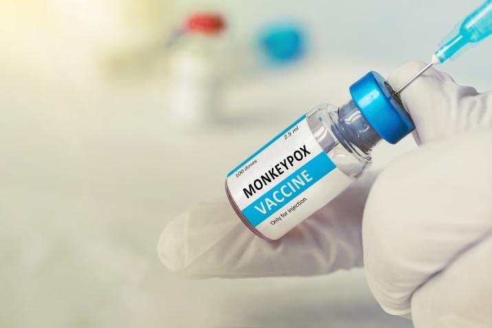 A photo illustration of a vial of monkeypox vaccine