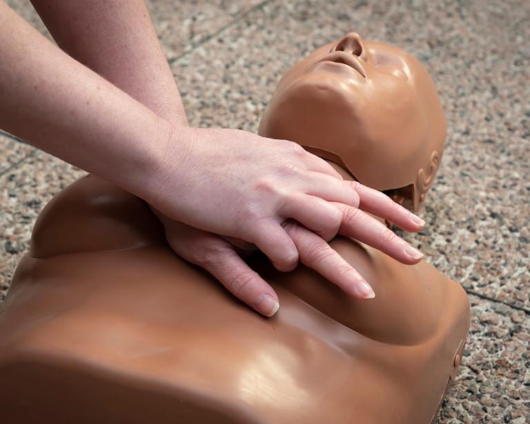 CPR administered to a manikin with breasts