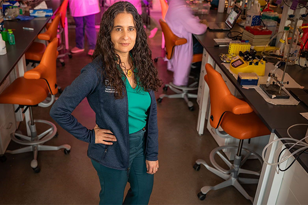 Portrait of Tatiana Segura in a busy lab