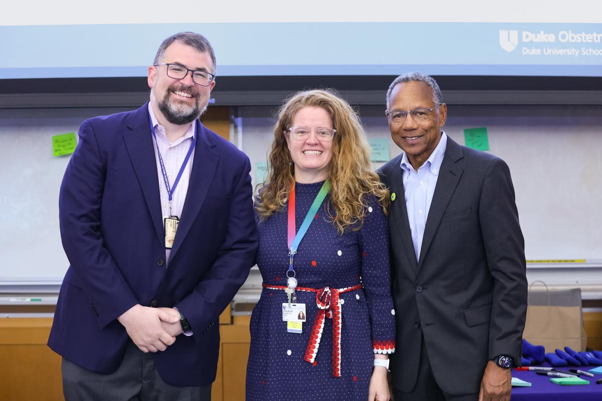Group portrait of Robert Tighe, Beverly Gray, and A. Eugene Washington