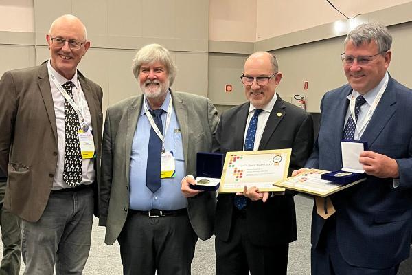 Joseph Heitman, MD, PhD, (second from right) at the 2025 Georg Award ceremony.