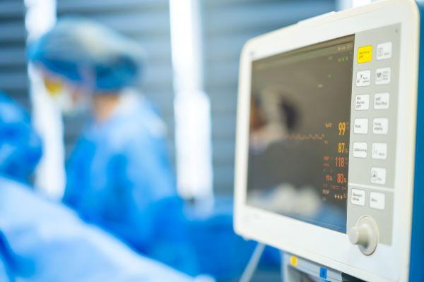Monitor in an operating room showing patient vital signs readings