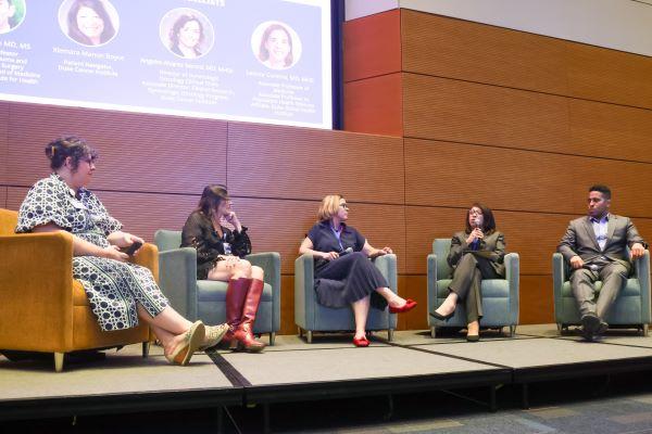Xiomara Monon Boyce second from right, speaks during a panel discussion with Samantha Cauthorn, left, Angeles Alvarez Secord, Leonor Corsino, and Christian Péan during ¡DALHE!’s Hispanic Heritage Month celebration. 