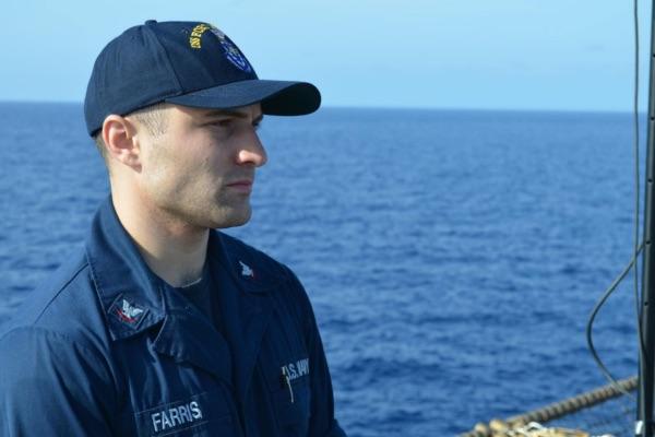 Rob Farris, DPT student, aboard a ship during his career in the U.S. Navy