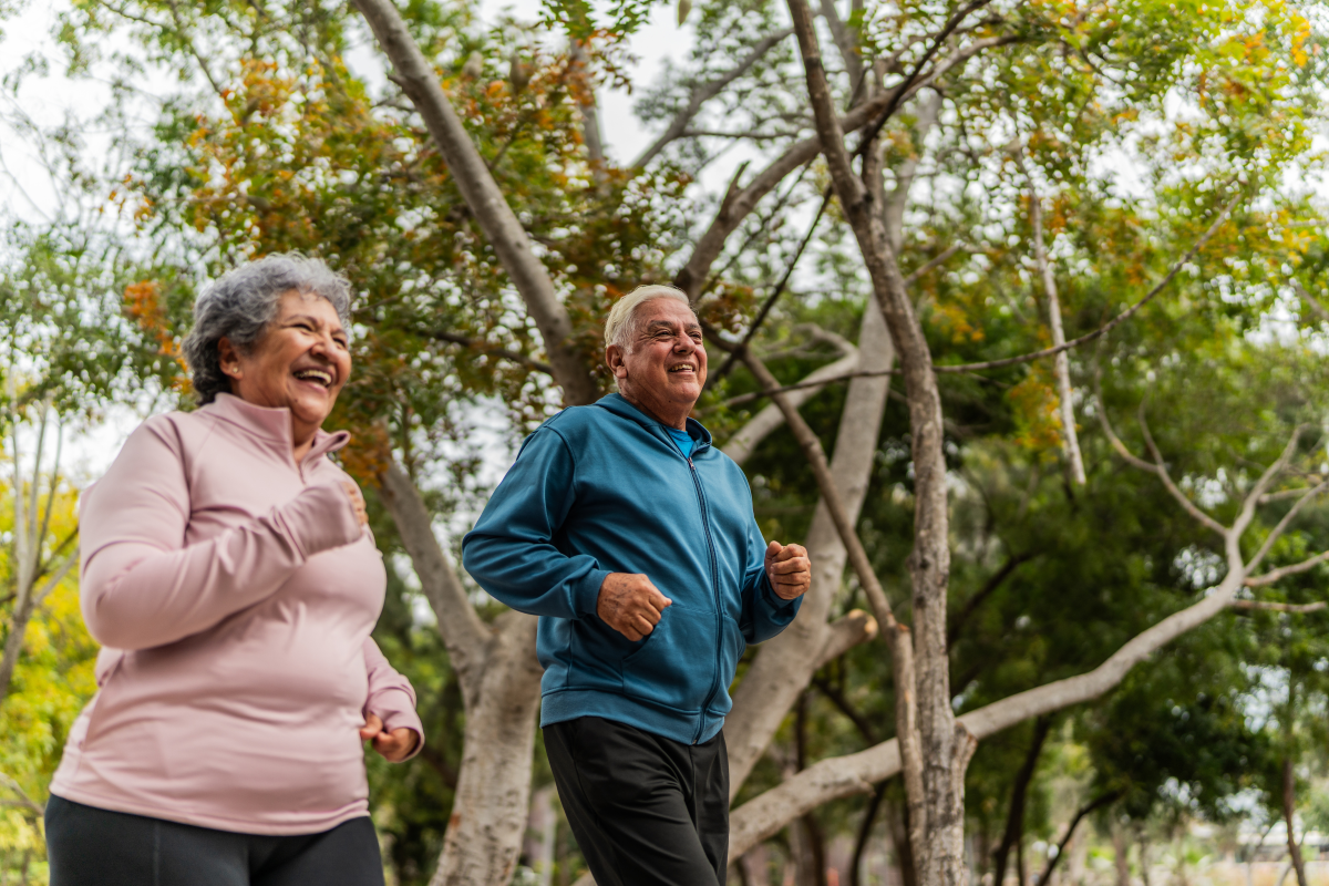 Older couple jogging together