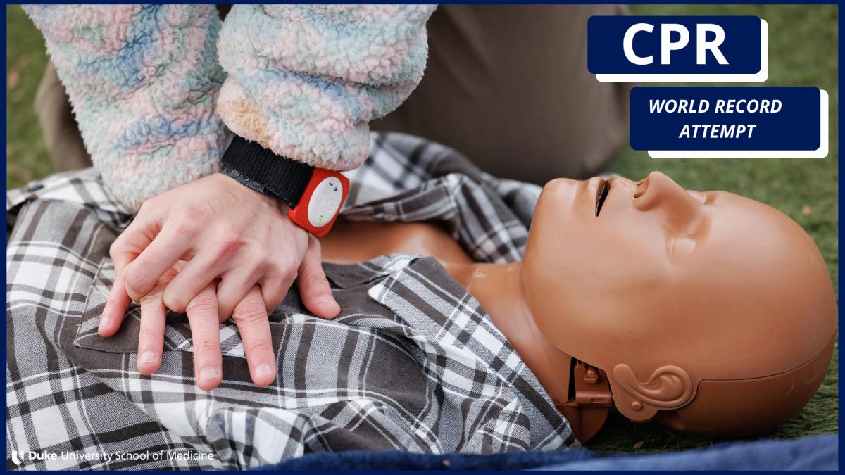 Performing CPR on a mannekin