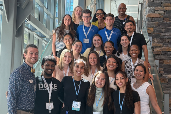 DPT student group posed on stairs 