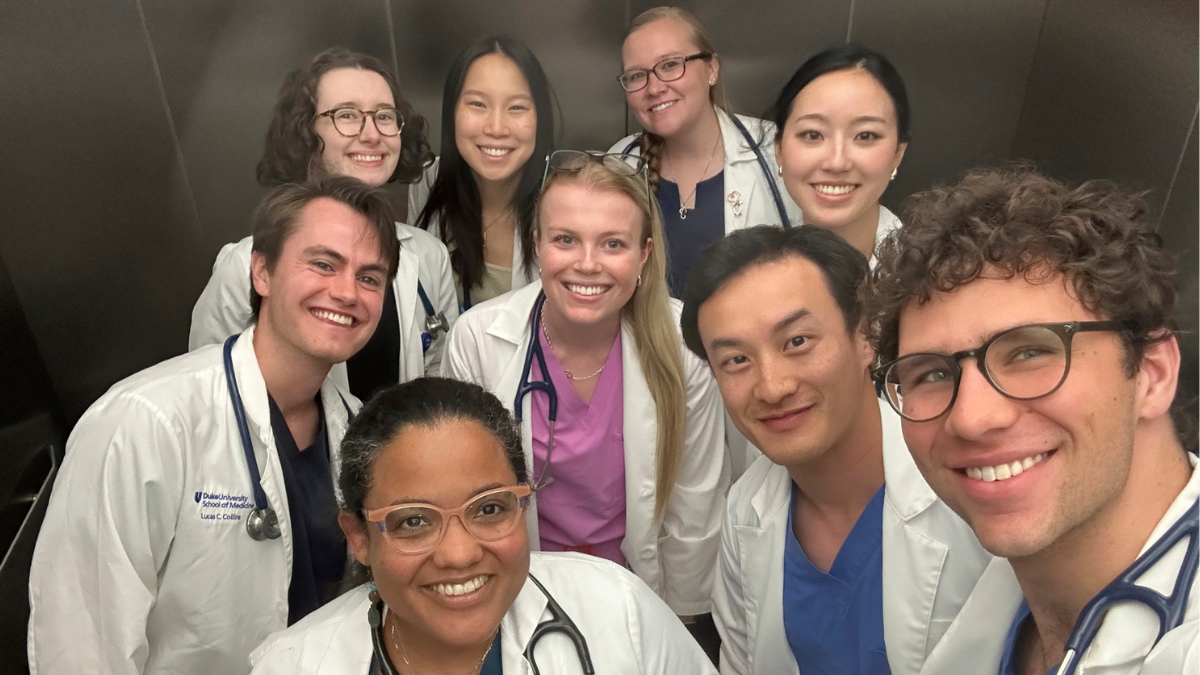 Lucas Collins, second row far left, with medical school classmates.