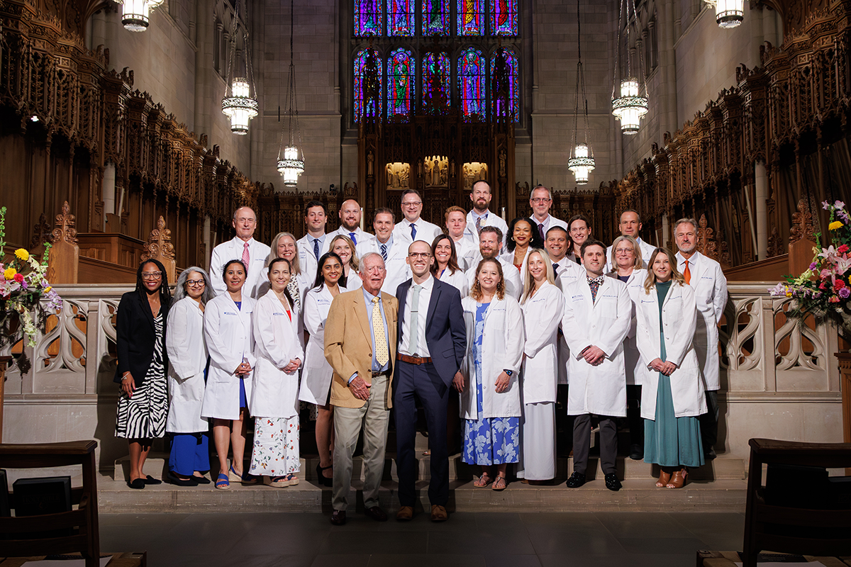 group shot of speaker and leaders at DPT white coat ceremony