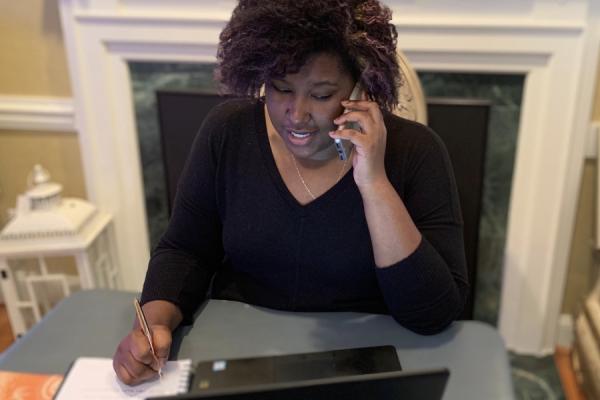 woman on the phone in her home