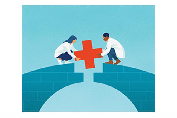 Two people putting placing a red cross as the keystone of an arch in a bridge