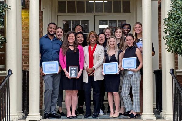 Group photo of gift and giving award recipients and Dr. Barnett