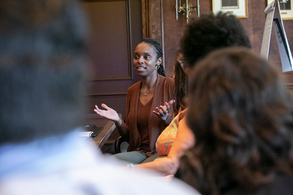 Black woman leading a meeting