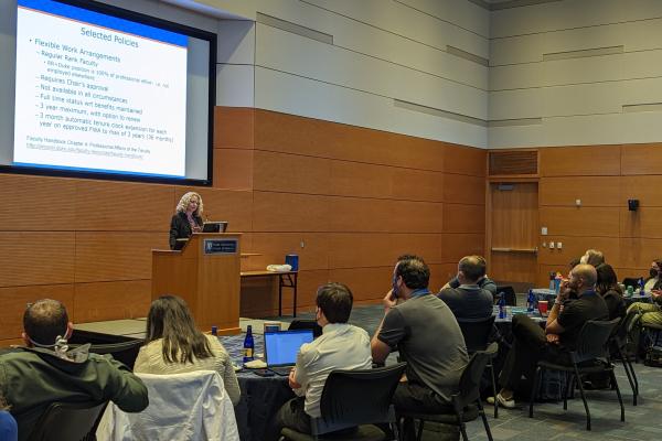 Dr. Mara Becker speaking to orientation participants in the Great Hall