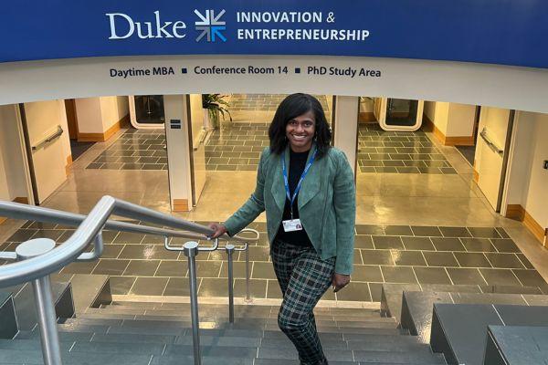 Dr. Faison on the staircase at the School of Business 