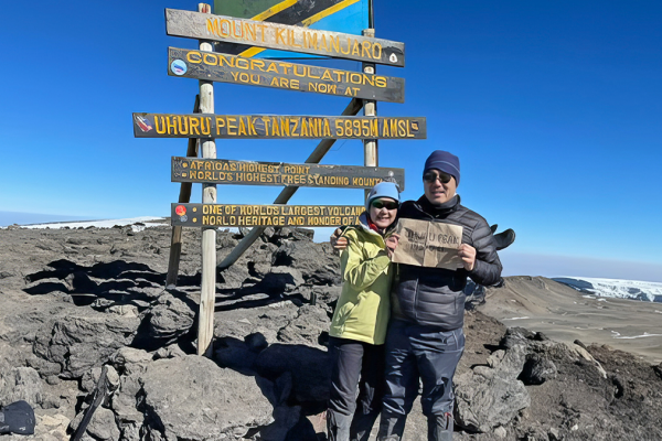 Dr. Shelley Hwang, MD, Mary and Deryl Hart Distinguished Professor of Surgery, and husband John Kim on top of Mount Kilimanjaro in Kenya. 