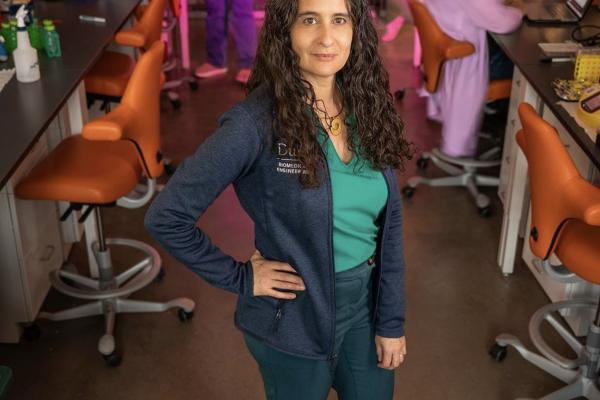 Portrait of Tatiana Segura in a busy lab