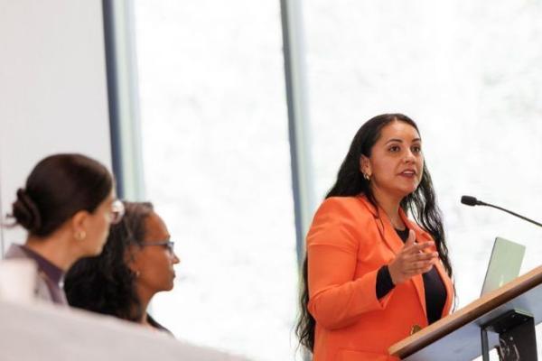 Elizabeth Rojo addresses an audience.