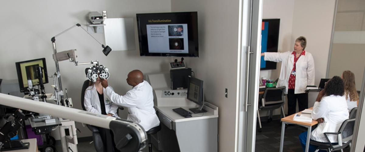 Students in the Opt. Tech program in practicum lab