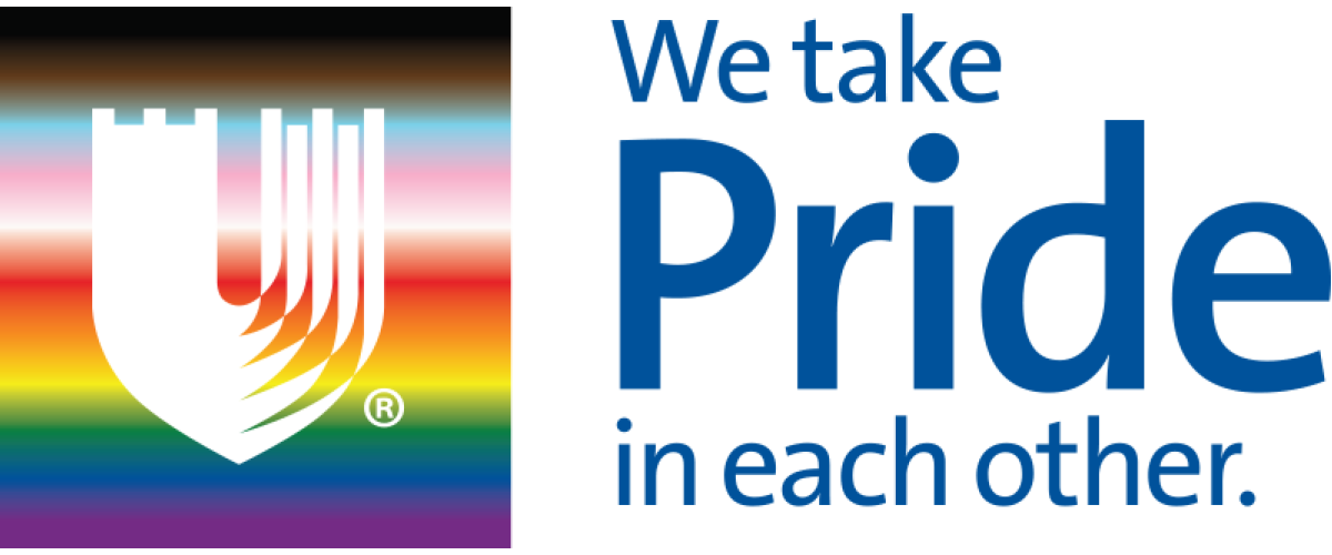 Pride Flag behind Duke Health Logo. We take pride in each other. 