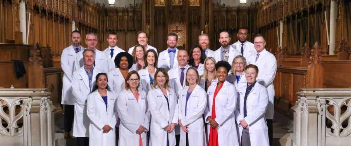 A group of faculty standing on the Duke Chapel altar