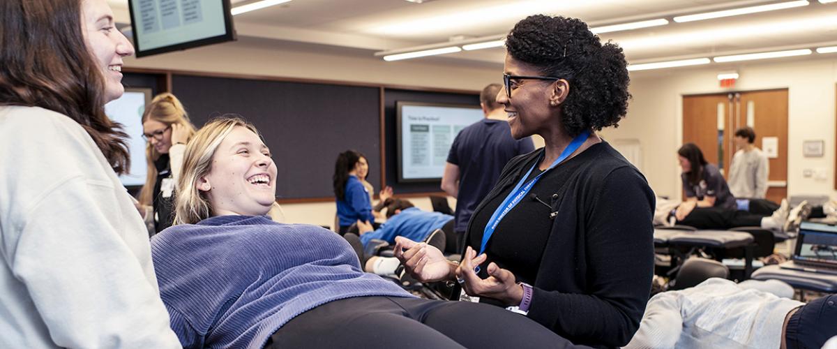 students and faculty in a plinth lab