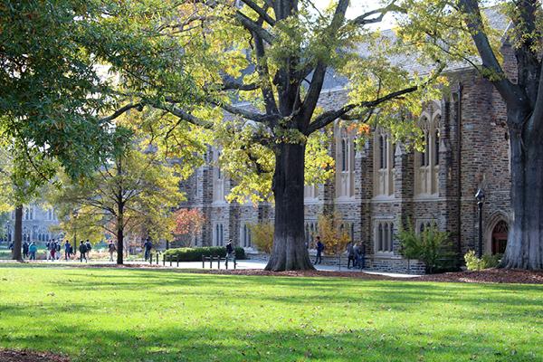 West Campus Quad and Rubenstein Library through Oak trees