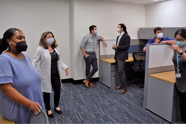 Duke Aging Center Director Dr. Heather Whitson shows off the center's new shared workspace. Photo by Stephen Schramm.