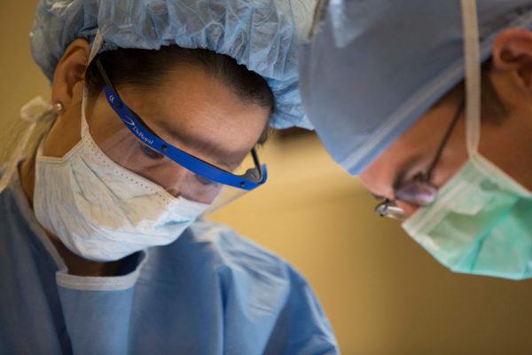 Dr. Shelly Hwang in PPE, during surgery