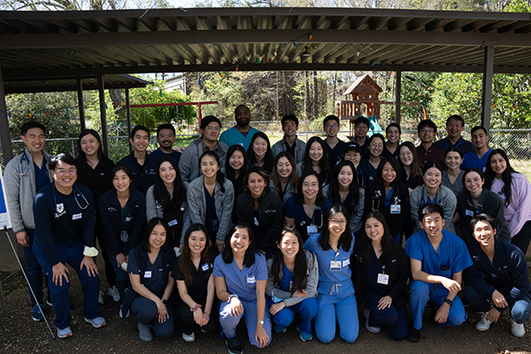 group photo of Asian and Pacific Islander Medical Student Association members at a health fair