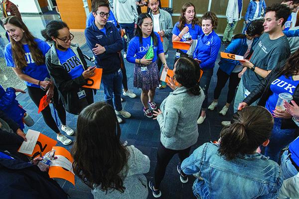 Rhea Dash instructs prospective students on how to work through a team learning exercise.