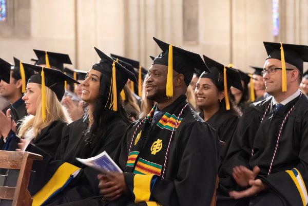 Class of 2023 graduates sitting in Duke Chapel