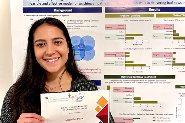 Alejandra Patino and her award winning poster