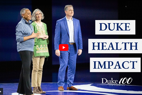 Drs. Turek and Markert on stage with Centennial Celebration Host Lisa Borders