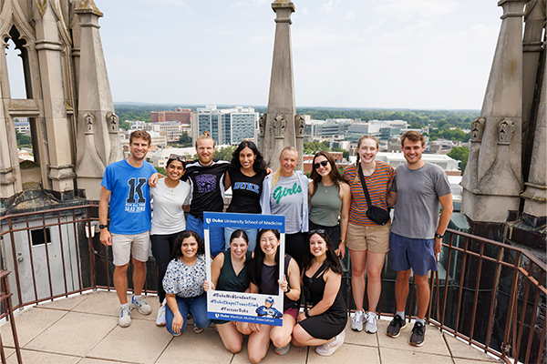 MD Students pose at the top of the Duke Chapel Tower.