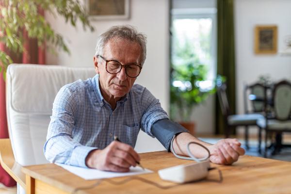 Man checking his blood pressure