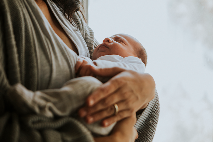 mother holding her baby