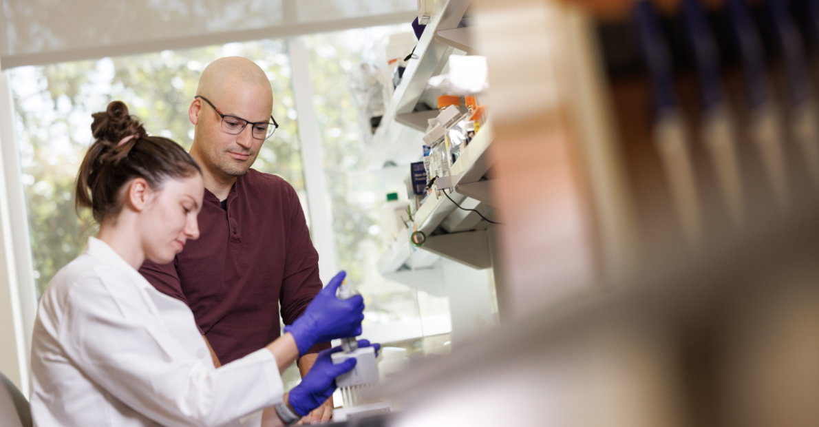 Jonathan Campbell, PhD, associate professor in the Division of Endocrinology in the Department of Medicine, and lab manager Danielle Leander collaborate in the lab in Duke’s Carmichael Building. Campbell and colleagues at Duke are uncovering the secrets behind the remarkable effects of GLP-1 drugs. 