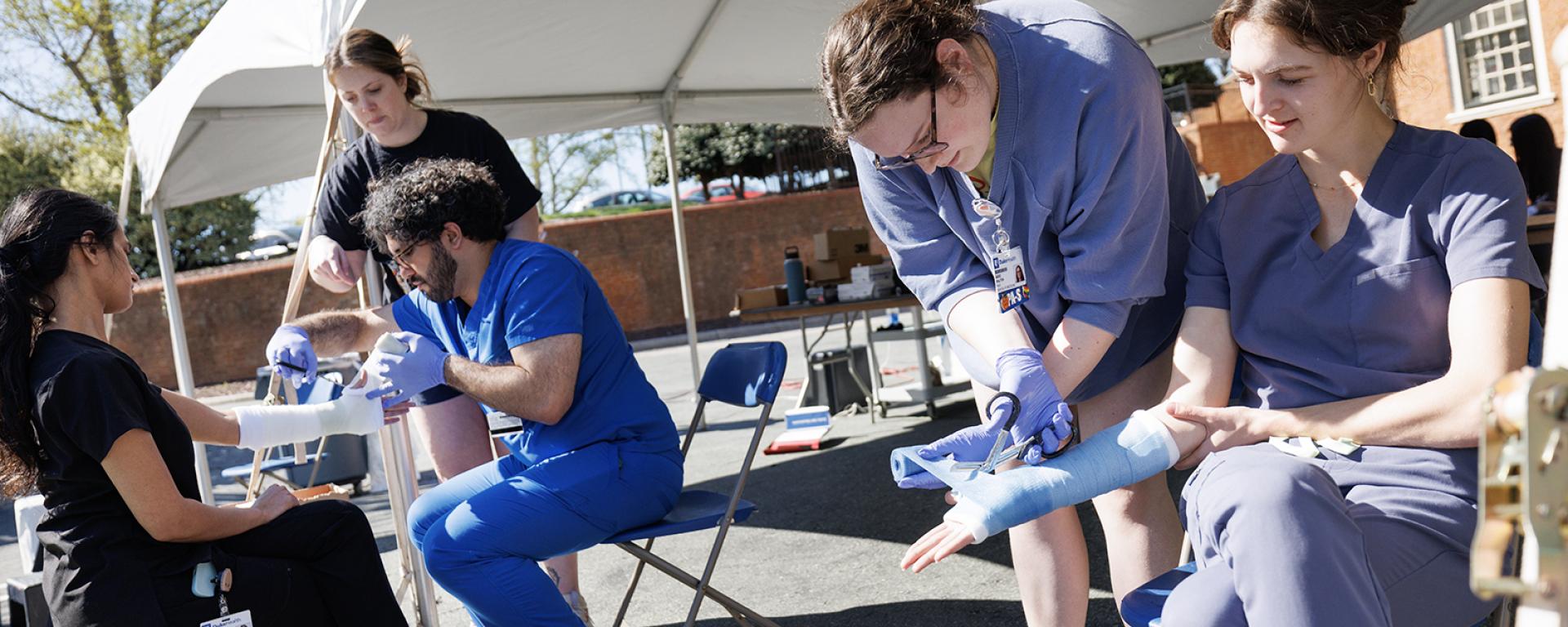 PA students learning how to apply and remove casts