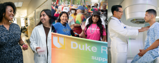 Faculty, students and staff of various races and ethnicities with a pride sign in the middle. 