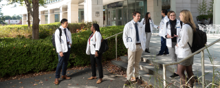 MD Students chatting in front of the Trent Semans Center