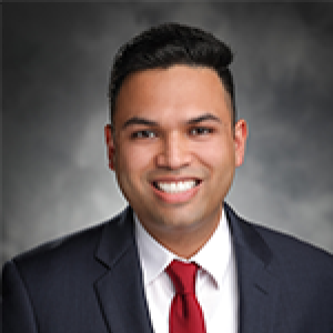 MSTP Student Vishwas Rao in front of grey backdrop