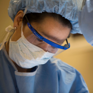 Dr. Shelly Hwang in PPE, during surgery