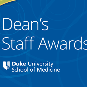 Dean's staff Award over SoM Logo