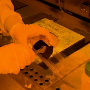 Jay Dalton prepares a silicon wafer for a microelectronics experiment