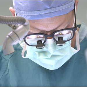 Dr. Southwell in Mask & PPE in Surgery