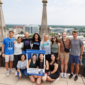 MD Students pose at the top of the Duke Chapel Tower.