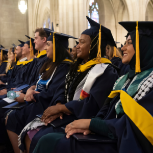Row of students in graduation attire in Duke Chapel