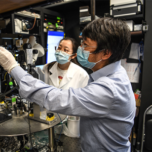 Nuo Li, PhD in his lab 